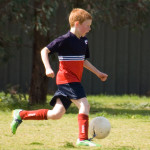Running and Kicking the Soccer Ball